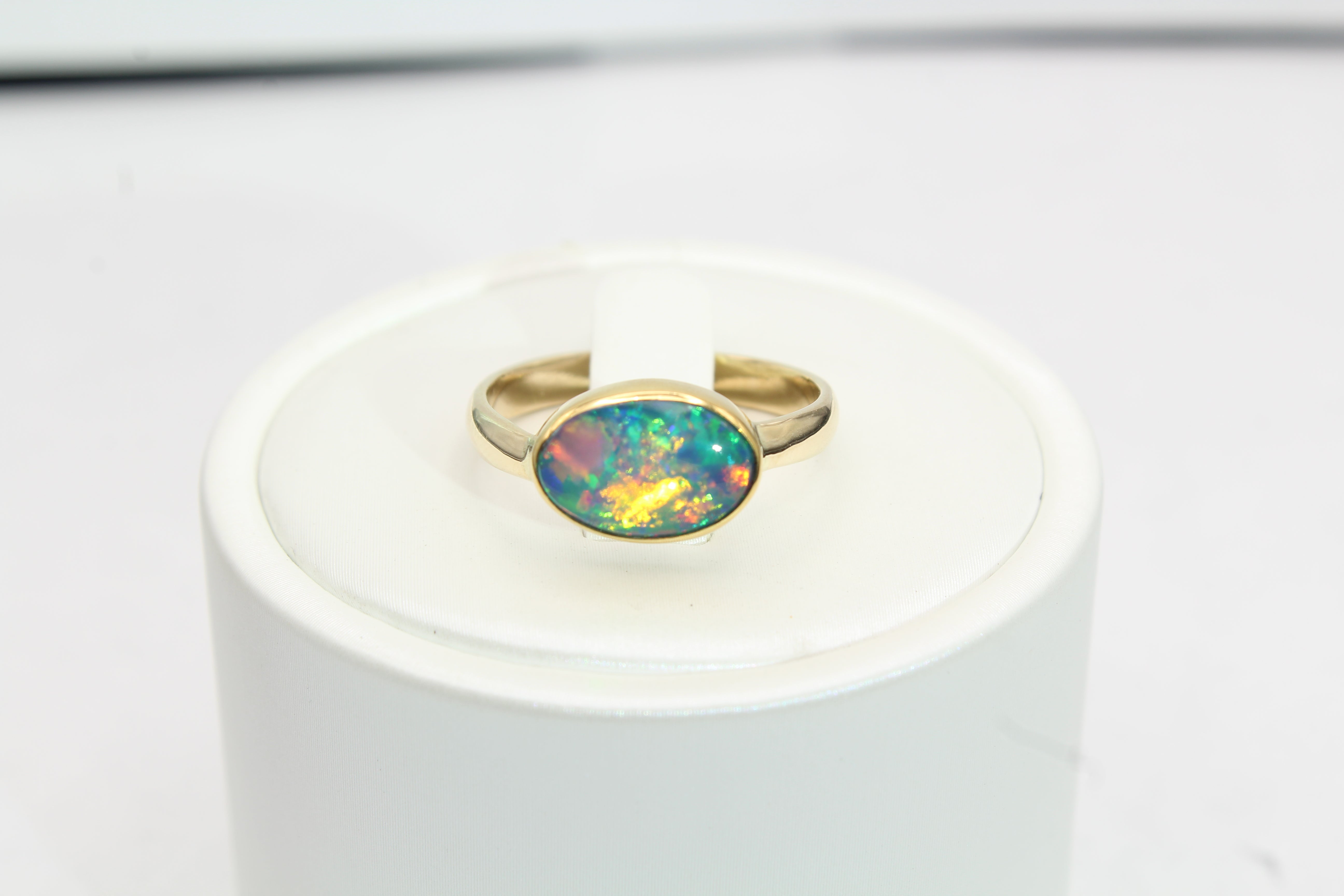 Oval Ethiopian Opal Ring with 22k Gold Bezel