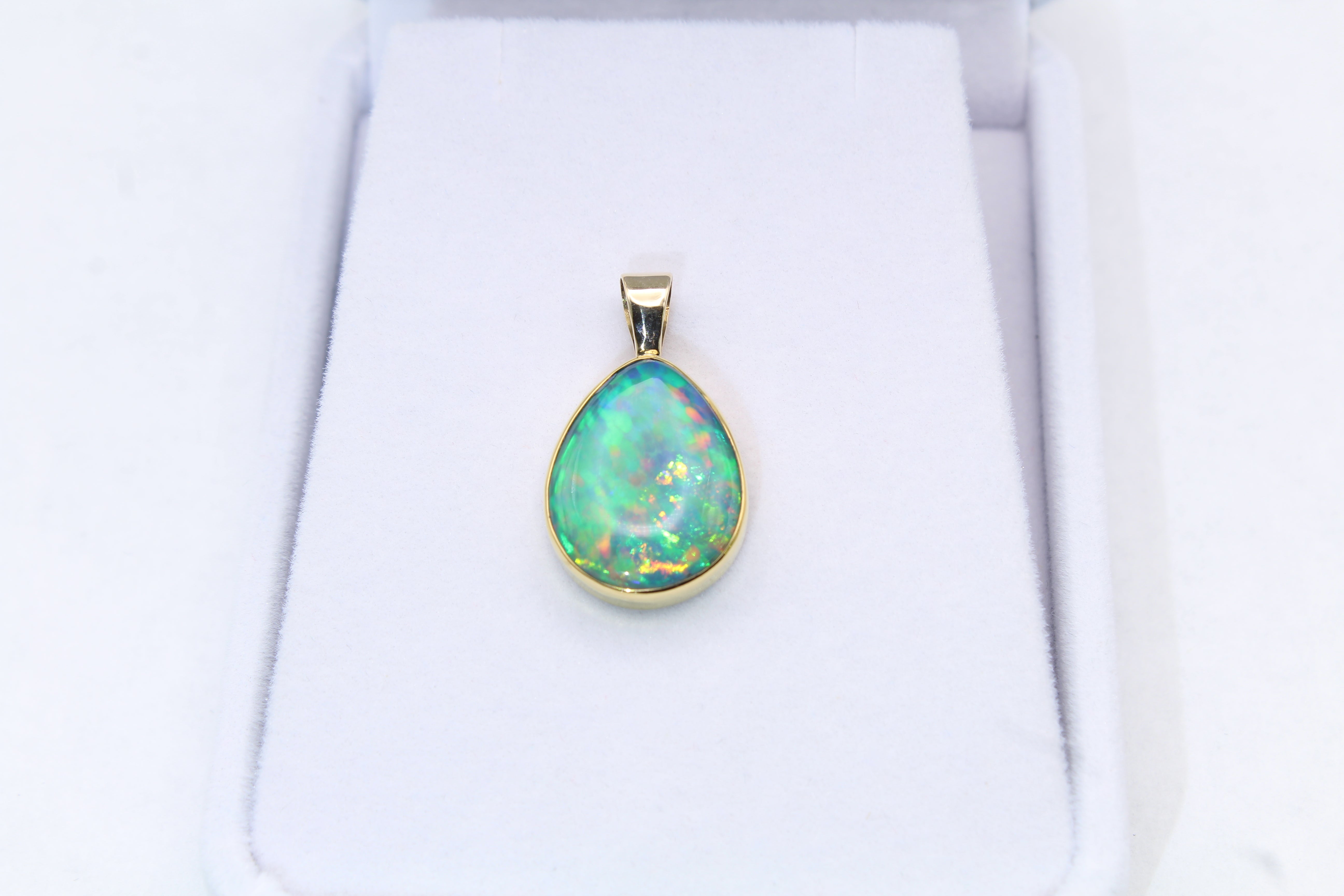 Ethiopian Opal Pendant in 22k Gold Bezel with 14k Bail