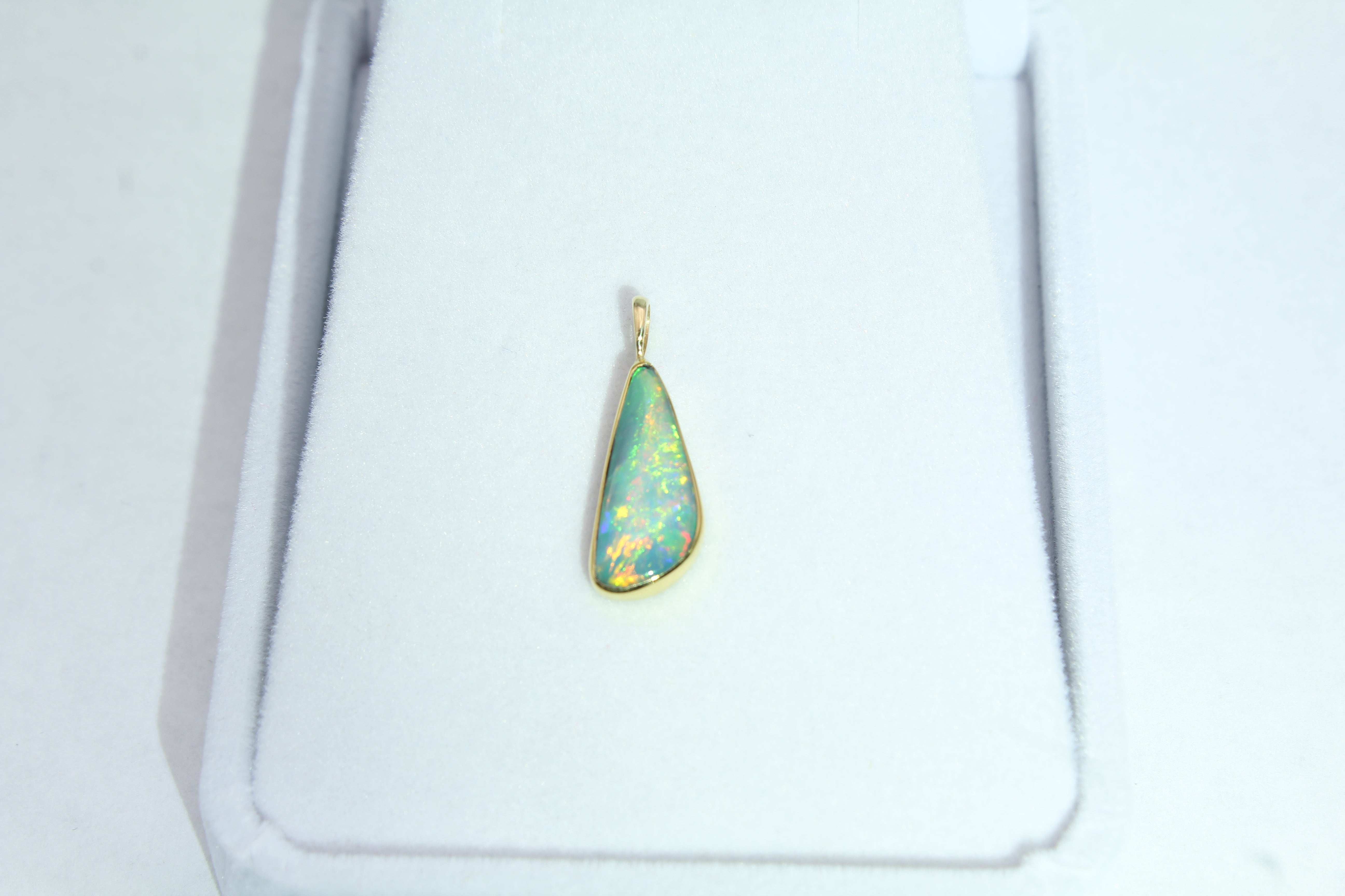 Radiant Ethiopian Opal Pendant | Solid Gold Design