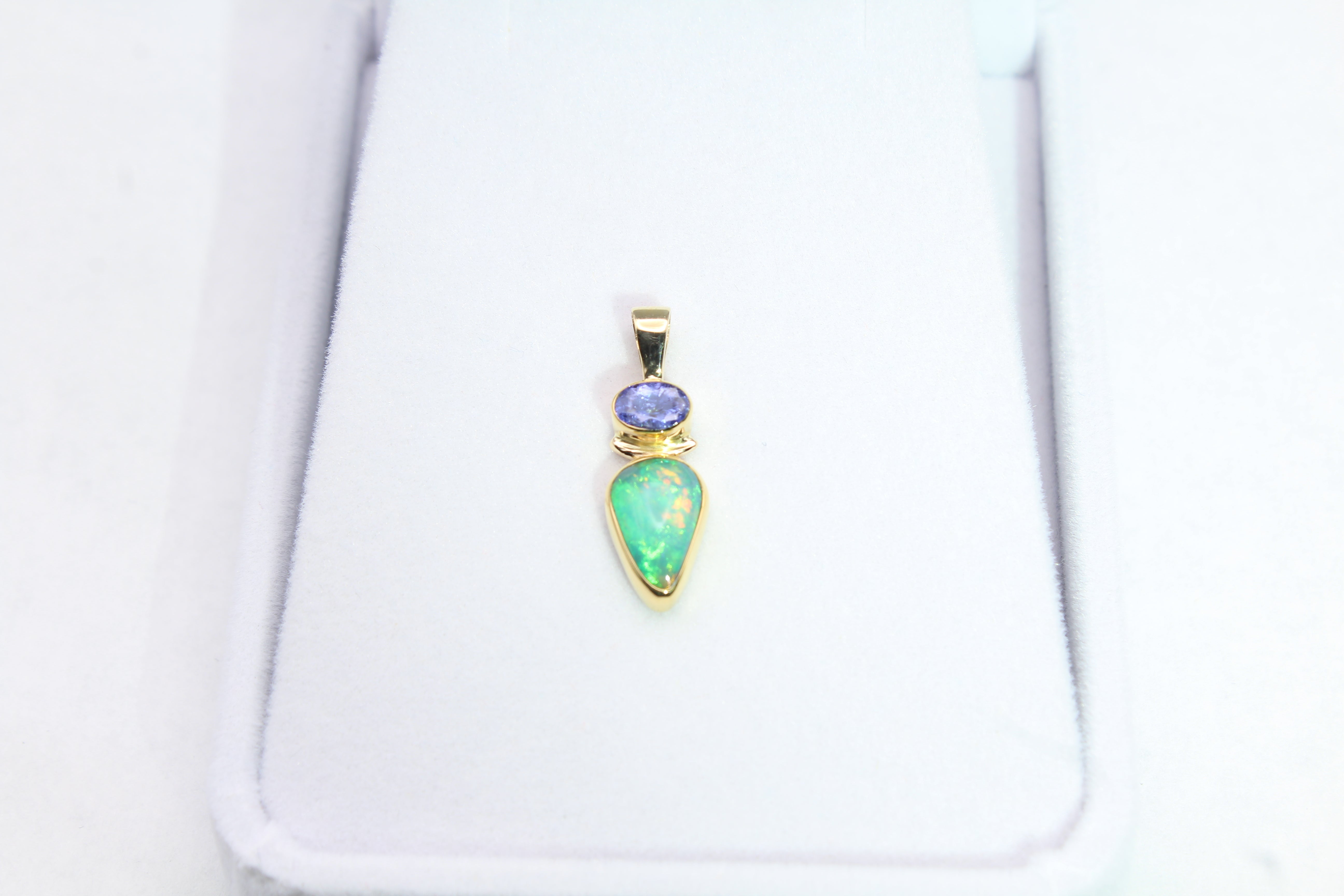 Artisan Crafted Ethiopian Opal Pendant with Tanzanite | Gold Bezel