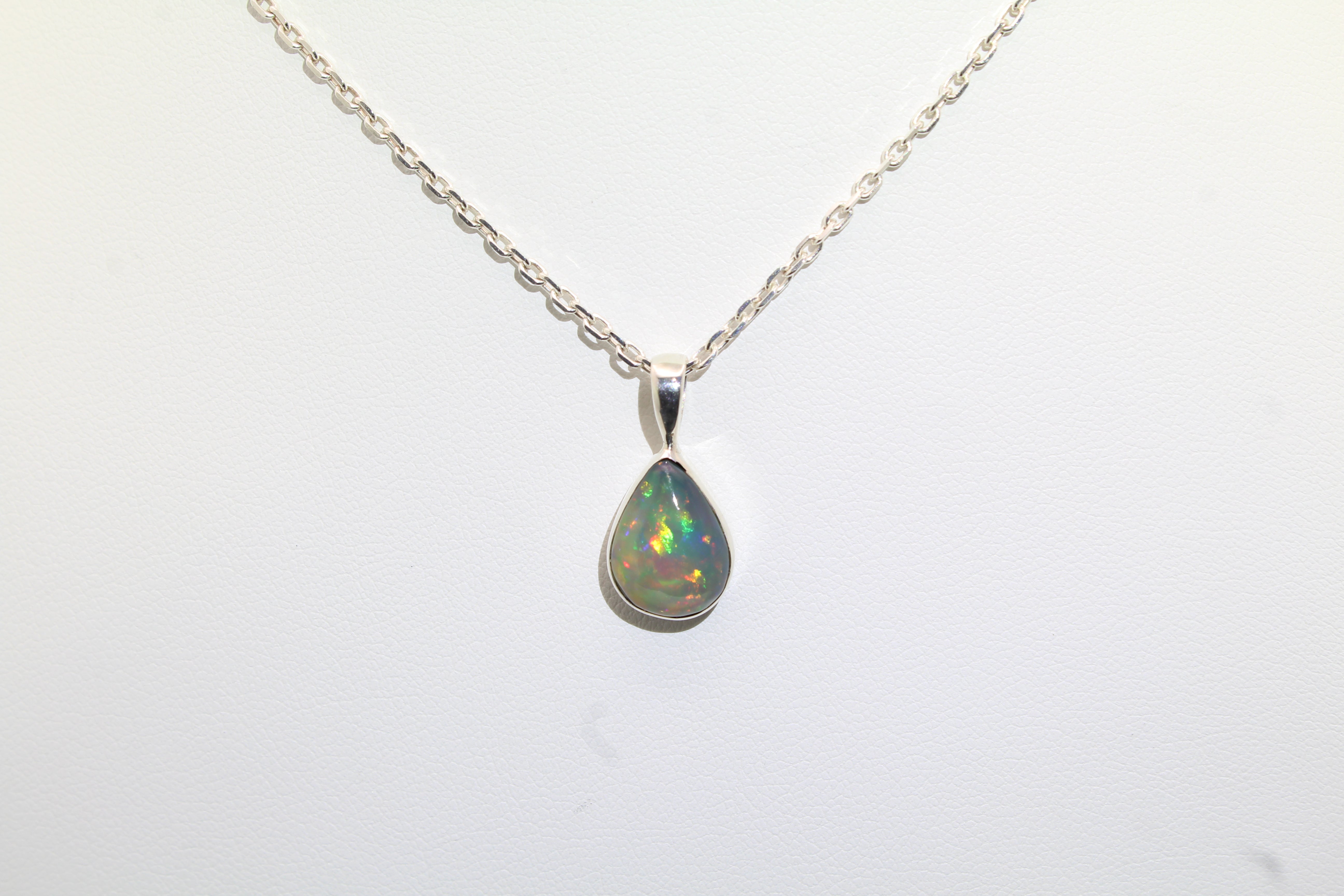 Luminous Ethiopian Opal Pendant | Sterling Silver Pear Shape Necklace