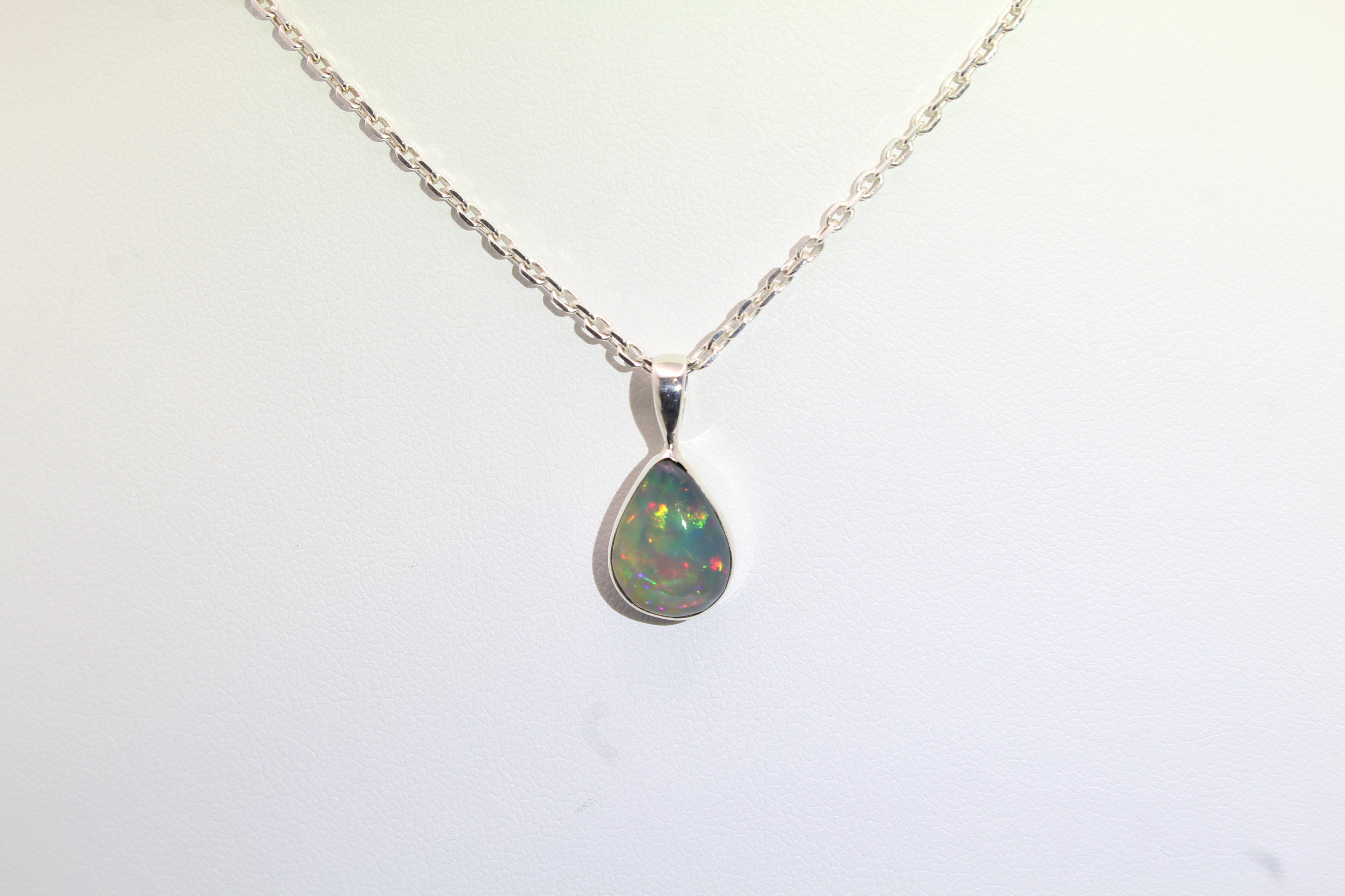 Luminous Ethiopian Opal Pendant | Sterling Silver Pear Shape Necklace